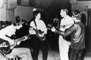 The Beatles with George Martin in the studio, 1966