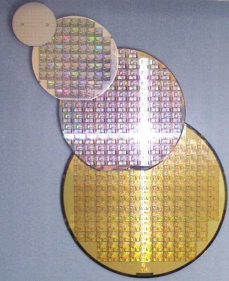 Silicon wafers of different sizes - foundation of modern computing
