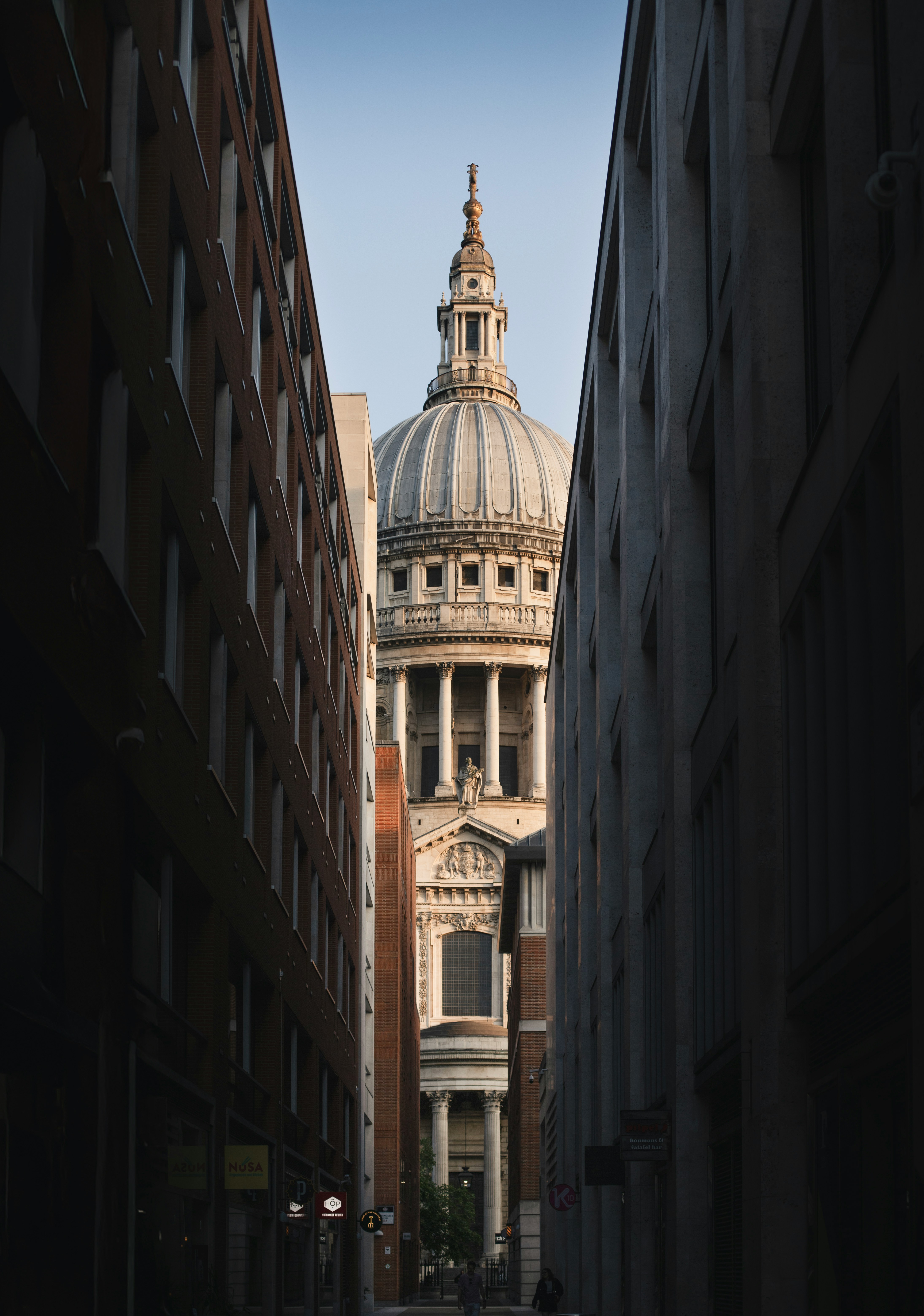 St Paul's Cathedral dome viewed between modern London buildings
