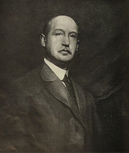 Walter Camp, portrait by George M. Reevs, 1909. The Father of American Football, shown in formal Victorian attire with his characteristic balding head and small mustache.
